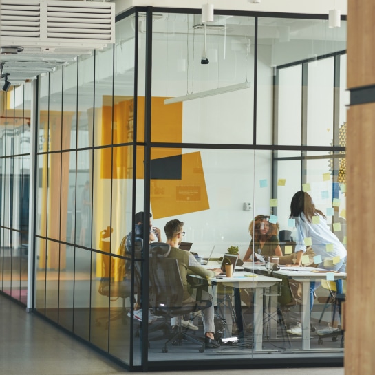 Team in a glass meeting room